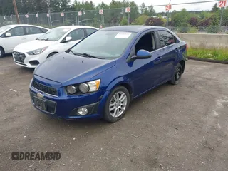 2012 Chevrolet Sonic LT with VIN 1G1JC5SH1C4207756, listed as a IAAI auction lot 42291873 with 106,842 mi miles and . Bid and sale history available at DreamBid. Image 2.