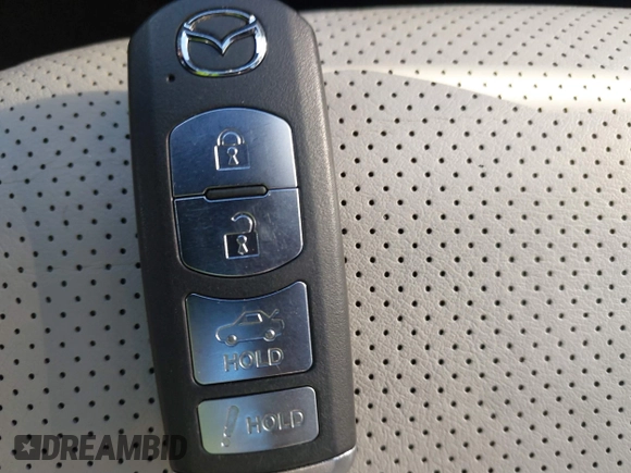 2015 Mazda 6 i Grand Touring with VIN JM1GJ1W55F1183824, listed as a IAAI auction lot 40840126 with 132,773 mi miles. Bid and sale history available at carsss.com. Image 11.