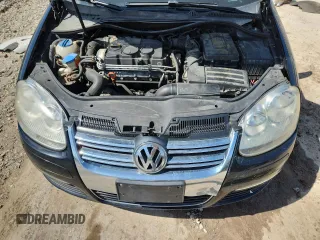 2006 Volkswagen Jetta 1.9L TDI z VIN 3VWDT71K46M043065, wystawiony jako Copart lot #62080885 z przebiegiem 279 917 mil mil oraz Nie do naprawy • Non repairable. Historia ofert i sprzedaży dostępna na DreamBid. Obrazek 11.