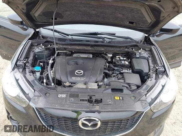2014 Mazda CX-5 Touring with VIN JM3KE2CY7E0341658, listed as a IAAI auction lot 41915807 with 99,287 mi miles. Bid and sale history available at carsss.com. Image 10.