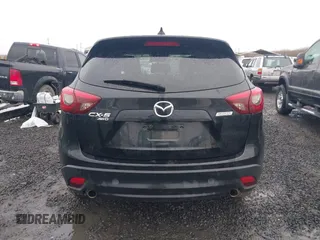 2016 Mazda CX-5 Grand Touring z VIN JM3KE4DY5G0742686, wystawiony jako IAAI lot #41598719 z przebiegiem 117 643 mil mil oraz . Historia ofert i sprzedaży dostępna na DreamBid. Obrazek 17.