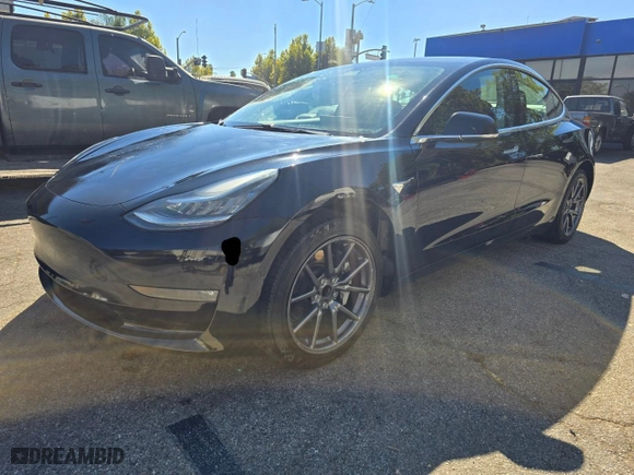 2018 Tesla Model 3 Long Range Battery with VIN 5YJ3E1EA0JF173302, listed as a Copart auction lot 54197265 with 59,956 mi miles and Salvage Title. Bid and sale history available at carsss.com. Image 2.