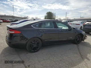 2019 Ford Fusion Hybrid Titanium with VIN 3FA6P0RU0KR144636, listed as a Copart auction lot 44357323 with 100,146 mi miles. Bid and sale history available at carsss.com. Image 3.