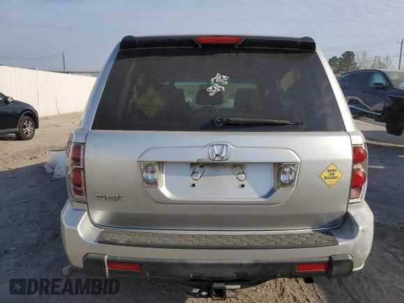 2006 Honda Pilot LX z VIN 5FNYF28166B031046, wystawiony jako Copart lot #51090455 z przebiegiem 284 744 mil mil oraz Czysty tytuł • Clean title. Historia ofert i sprzedaży dostępna na DreamBid. Obrazek 6.