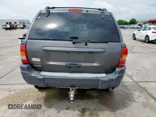 2003 Jeep Grand Cherokee Laredo with VIN 1J4GW48SX3C569087, listed as a Copart auction lot 55941035 with Not provided miles and Salvage title. Bid and sale history available at DreamBid. Image 6.