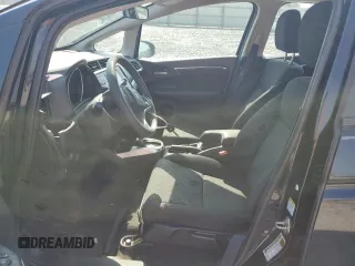 2015 Honda Fit LX with VIN 3HGGK5H56FM736969, listed as a Copart auction lot 52485405 with 142,736 mi miles and Salvage Title. Bid and sale history available at carsss.com. Image 7.