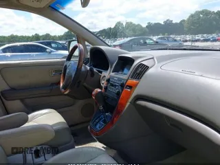 2002 Lexus RX 300 with VIN JTJGF10U920133281, listed as a IAAI auction lot 38054792 with 220,304 mi miles and . Bid and sale history available at DreamBid. Image 5.