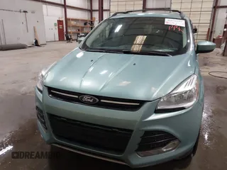 2013 Ford Escape SE with VIN 1FMCU0GX9DUB40739, listed as a IAAI auction lot 41633757 with 87,522 mi miles and . Bid and sale history available at DreamBid. Image 12.