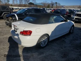 2011 BMW 1 Series 128i with VIN WBAUN1C53BVH82638, listed as a Copart auction lot 85823794 with 137,142 mi miles and Salvage title. Bid and sale history available at DreamBid. Image 3.