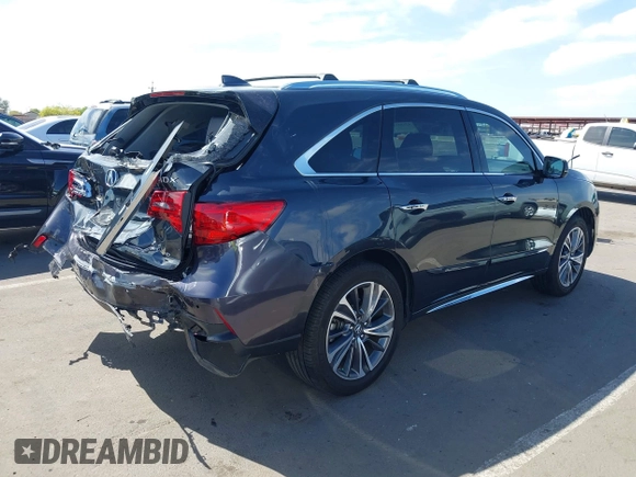 2019 Acura MDX Technology with VIN 5J8YD4H5XKL029023, listed as a IAAI auction lot 42108214 with 73,535 mi miles and . Bid and sale history available at DreamBid. Image 4.
