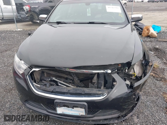 2014 Ford Taurus Limited with VIN 1FAHP2F81EG113984, listed as a IAAI auction lot 41542792 with 213,206 mi miles. Bid and sale history available at carsss.com. Image 13.