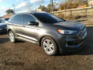 2020 Ford Edge SEL z VIN 2FMPK4J9XLBB61581, wystawiony jako IAAI lot #40786041 z przebiegiem 65 445 mil mil oraz . Historia ofert i sprzedaży dostępna na DreamBid. Obrazek 1.