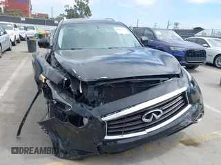 2014 Infiniti QX70 z VIN JN8CS1MW6EM410091, wystawiony jako IAAI lot #41896327 z przebiegiem 139 021 mil mil oraz . Historia ofert i sprzedaży dostępna na DreamBid. Obrazek 6.