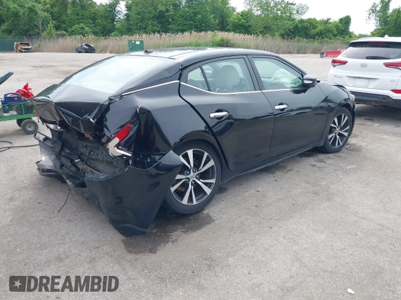 2017 Nissan Maxima Platinum with VIN 1N4AA6AP2HC404319, listed as a IAAI auction lot 42225731 with 156,833 mi miles and . Bid and sale history available at DreamBid. Image 4.