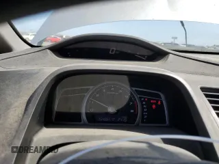 2010 Honda Civic DX-VP z VIN 19XFA1F32AE080022, wystawiony jako Copart lot #57983445 z przebiegiem 154 065 mil mil oraz Szkoda całkowita • Salvage title. Historia ofert i sprzedaży dostępna na DreamBid. Obrazek 9.