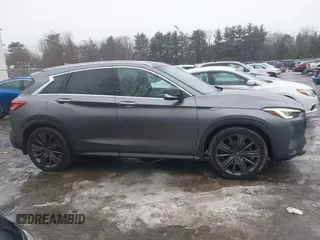 2020 Infiniti QX50 Essential with VIN 3PCAJ5M36LF109877, listed as a IAAI auction lot 41552926 with 62,486 mi miles and . Bid and sale history available at DreamBid. Image 13.