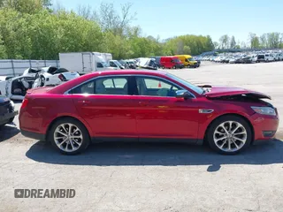 2014 Ford Taurus Limited z VIN 1FAHP2F87EG131051, wystawiony jako IAAI lot #42197519 z przebiegiem 110 715 mil mil oraz . Historia ofert i sprzedaży dostępna na DreamBid. Obrazek 13.