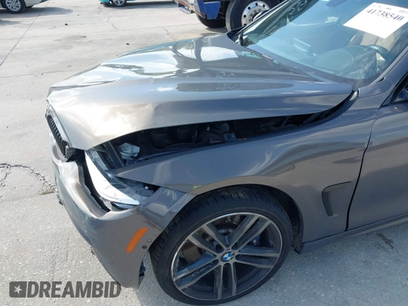 2018 BMW 4 Series 440i with VIN WBA4J5C54JBF07315, listed as a IAAI auction lot 41738540 with 74,577 mi miles and . Bid and sale history available at DreamBid. Image 6.