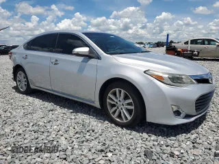 2013 Toyota Avalon XLE with VIN 4T1BK1EB6DU037938, listed as a Copart auction lot 62709525 with 104,616 mi miles and Salvage title. Bid and sale history available at DreamBid. Image 4.