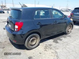 2008 Scion xD with VIN JTKKU10438J014799, listed as a IAAI auction lot 42107563 with 215,136 mi miles. Bid and sale history available at carsss.com. Image 4.