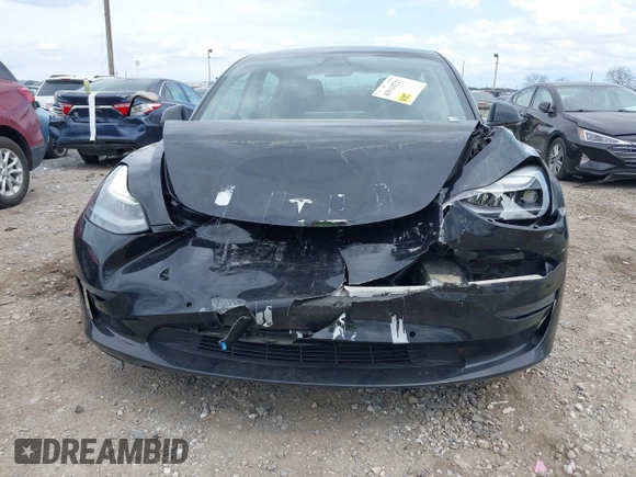 2021 Tesla Model 3 Long Range with VIN 5YJ3E1EB4MF012822, listed as a IAAI auction lot 41918721 with 69,105 mi miles. Bid and sale history available at carsss.com. Image 12.