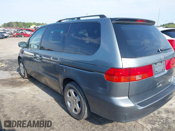 2001 Honda Odyssey EX z VIN 2HKRL18601H532141, wystawiony jako IAAI lot #41981052 z przebiegiem 126 931 mil mil oraz . Historia ofert i sprzedaży dostępna na DreamBid. Obrazek 3.
