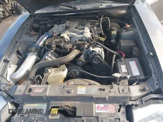 2003 Ford Mustang Standard z VIN 1FAFP40463F341216, wystawiony jako IAAI lot #42601357 z przebiegiem 145 520 mil mil oraz . Historia ofert i sprzedaży dostępna na DreamBid. Obrazek 10.