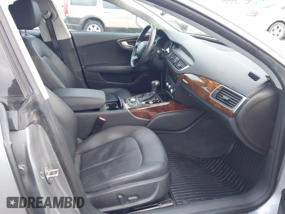 2014 Audi A7 Premium Plus z VIN WAUWGAFC9EN096702, wystawiony jako IAAI lot #41202201 z przebiegiem 103 893 mil mil oraz . Historia ofert i sprzedaży dostępna na DreamBid. Obrazek 5.