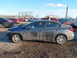2012 Honda Civic EX-L with VIN 2HGFB2F9XCH587038, listed as a IAAI auction lot 41337259 with 114,520 mi miles and . Bid and sale history available at DreamBid. Image 15.