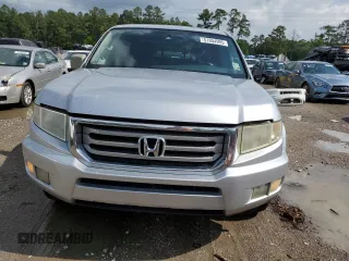 2014 Honda Ridgeline RTL with VIN 5FPYK1F58EB012869, listed as a Copart auction lot 51854995 with 318,950 mi miles and Salvage title. Bid and sale history available at DreamBid. Image 5.