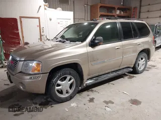 2006 GMC Envoy SLE with VIN 1GKDT13S062160490, listed as a IAAI auction lot 41610149 with 1 mi miles. Bid and sale history available at carsss.com. Image 2.