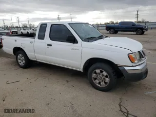 1998 Nissan Frontier 2WD XE with VIN 1N6DD26SXWC316312, listed as a Copart auction lot 51343345 with 124,461 mi miles and Salvage Title. Bid and sale history available at carsss.com. Image 4.