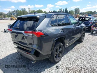 2021 Toyota RAV4 Hybrid XSE with VIN 4T3E6RFV2MU029187, listed as a IAAI auction lot 42620387 with 78,919 mi miles and . Bid and sale history available at DreamBid. Image 4.
