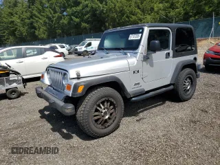 2003 Jeep Wrangler X z VIN 1J4FA39SX3P330554, wystawiony jako Copart lot #67107265 z przebiegiem 153 247 mil mil oraz Czysty tytuł • Clean title. Historia ofert i sprzedaży dostępna na DreamBid. Obrazek 1.