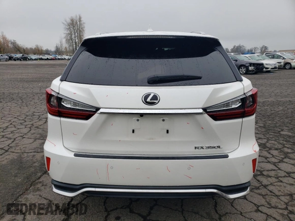 2020 Lexus RX 350L with VIN JTJHZKEA6L2014576, listed as a Copart auction lot 82706154 with 59,775 mi miles and Salvage title. Bid and sale history available at DreamBid. Image 6.