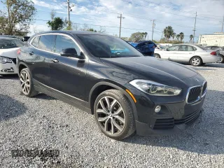 2019 BMW X2 sDrive28i with VIN WBXYJ3C56K5N36579, listed as a Copart auction lot 88320995 with 66,143 mi miles and Salvage Title. Bid and sale history available at carsss.com. Image 4.