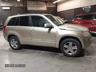 2007 Suzuki Grand Vitara Luxury z VIN JS3TD947474201594, wystawiony jako IAAI lot #42296225 z przebiegiem 120 309 mil mil oraz . Historia ofert i sprzedaży dostępna na DreamBid. Obrazek 13.