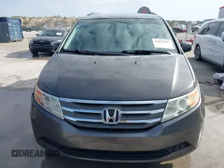 2012 Honda Odyssey EX-L with VIN 5FNRL5H60CB094682, listed as a IAAI auction lot 41570797 with 127,890 mi miles and . Bid and sale history available at carsss.com. Image 12.