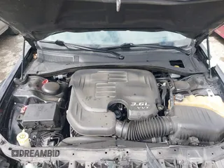2016 Chrysler 300 with VIN 2C3CCAEG9GH282438, listed as a IAAI auction lot 42025184 with 203,159 mi miles. Bid and sale history available at carsss.com. Image 10.