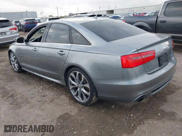 2013 Audi A6 3.0T Prestige with VIN WAUHGAFC3DN131239, listed as a IAAI auction lot 41168869 with 134,628 mi miles. Bid and sale history available at carsss.com. Image 3.