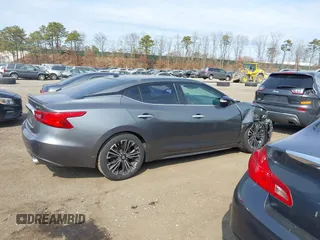 2016 Nissan Maxima SL z VIN 1N4AA6AP8GC417817, wystawiony jako IAAI lot #41772451 z przebiegiem 78 880 mil mil oraz . Historia ofert i sprzedaży dostępna na DreamBid. Obrazek 13.