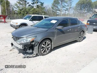 2018 Nissan Altima SR with VIN 1N4AL3AP6JC118424, listed as a IAAI auction lot 41697348 with 112,910 mi miles and . Bid and sale history available at carsss.com. Image 18.