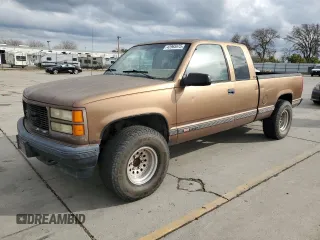 1994 GMC Sierra 1500 z VIN 2GTEK19K3R1588147, wystawiony jako Copart lot #43965975 z przebiegiem 293 853 mil mil oraz Tytuł czysty. Historia ofert i sprzedaży dostępna na DreamBid. Obrazek 1.