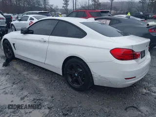 2014 BMW 4 Series 428i with VIN WBA3N7C52EF718794, listed as a IAAI auction lot 41416632 with 179,681 mi miles and . Bid and sale history available at carsss.com. Image 3.