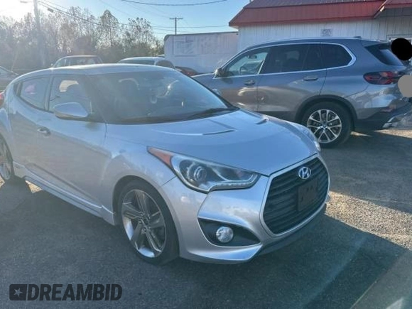 2013 Hyundai Veloster Turbo with VIN KMHTC6AE7DU115884, listed as a Copart auction lot 84959054 with 152,133 mi miles and Clean title. Bid and sale history available at DreamBid. Image 1.