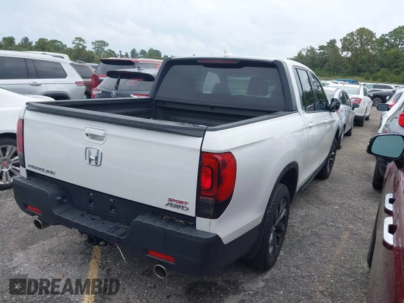 2023 Honda Ridgeline Sport z VIN 5FPYK3F14PB049364, wystawiony jako IAAI lot #40474507 z przebiegiem Nie podano mil oraz . Historia ofert i sprzedaży dostępna na DreamBid. Obrazek 4.