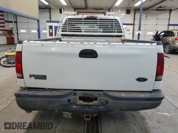 2003 Ford F-250 with VIN 3FTNX21L43MB35635, listed as a Copart auction lot 86396734 with Not provided miles and Salvage title. Bid and sale history available at DreamBid. Image 6.