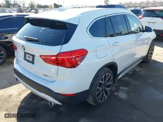 2021 BMW X1 sDrive28i with VIN WBXJG7C08M5S34659, listed as a IAAI auction lot 41841612 with 15,640 mi miles. Bid and sale history available at carsss.com. Image 4.