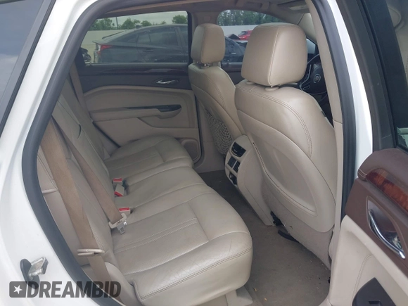 2014 Cadillac SRX Premium Collection with VIN 3GYFNDE31ES615995, listed as a IAAI auction lot 42148943 with 232,752 mi miles and . Bid and sale history available at DreamBid. Image 8.