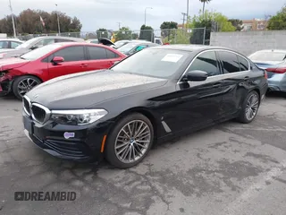 2019 BMW 5 Series 530e iPerformance with VIN WBAJA9C53KB388861, listed as a IAAI auction lot 41621712 with 68,128 mi miles. Bid and sale history available at carsss.com. Image 2.